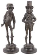 A pair of spelter figural candlesticks, 20th c. (2)