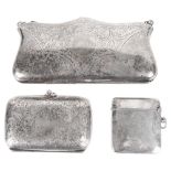 A silver cigarette case, vesta case and an EPNS evening purse(3)
