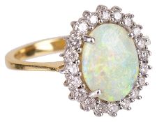 A Continental opal and diamond set cluster ring