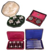 A collection of cased silver, seal top teaspoons, others (4 cases)