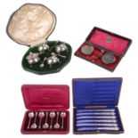 A collection of cased silver, seal top teaspoons, others (4 cases)