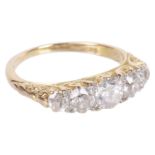 An early 20th c. attractive five stone diamond set half hoop ring