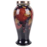 A Moorcroft 'Pomegranate' baluster vase, early 20th c.