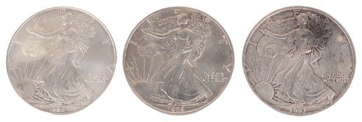 Three United States silver dollars, 1989, 1997, 1999(3)