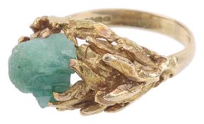 An unusual rough emerald set fancy ring