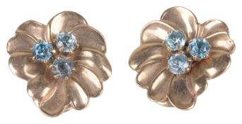 A pair of Continental blue zircon set floral ear clips, circa 1950