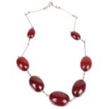 An Art Deco Cherry amber bead necklace