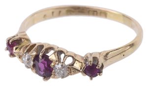 An early 20th c. ruby and diamond set fancy ring,