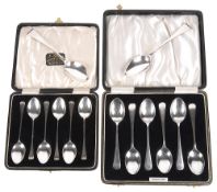 Two cased sets of George V silver teaspoons (14)