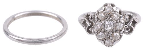 An early 20th c. Continental pave diamond set scroll mounted ring(2)