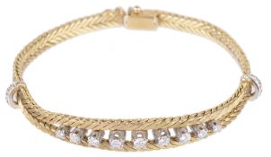 A Continental 18ct gold and diamond set articulated bracelet