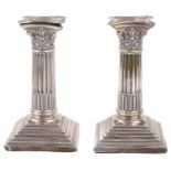 A pair of Edwardian silver dwarf candlestick, Sheffield 1909 (2)