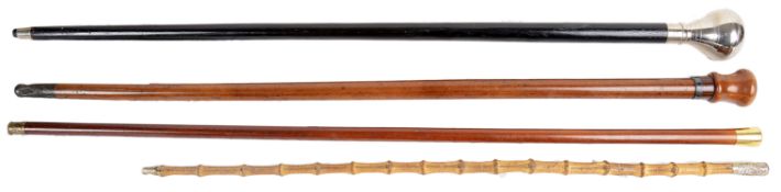 A Malacca walking cane with 15ct gold top(4)