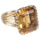 An attractive Continental yellow gem set dress ring