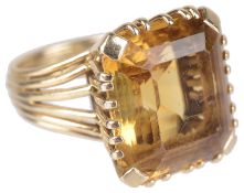 An attractive Continental yellow gem set dress ring