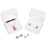 A contemporary pink topaz pendant and matching earrings