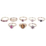 A collection of eight gold mounted gem set dress rings