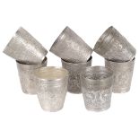 A set of eight Indonesian white metal beakers, early 20th c. (8)