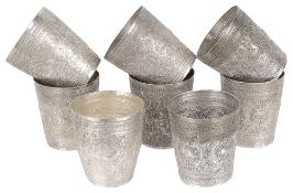 A set of eight Indonesian white metal beakers, early 20th c. (8)