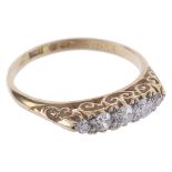 An 18ct gold mounted five stone diamond set ring
