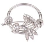 A Continental 14K white gold diamond set cocktail brooch, circa 1960