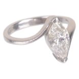 A platinum mounted single stone marquis shaped diamond set ring,