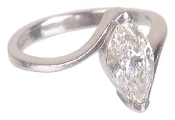 A platinum mounted single stone marquis shaped diamond set ring,