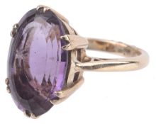 A large Continental amethyst set dress ring