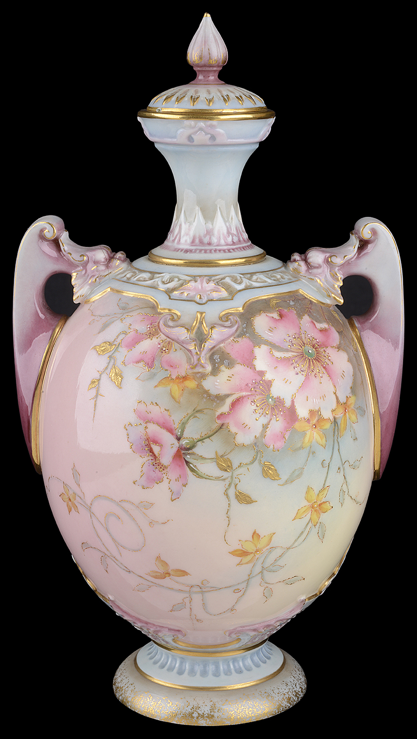 A Royal Worcester twin handled vase and cover