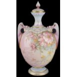 A Royal Worcester twin handled vase and cover