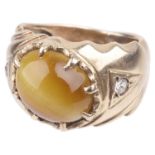 A gentleman's cat' eye chrysoberyl and diamond set ring