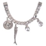 A heavy sterling silver charm bracelet including a Georg Jensen charm