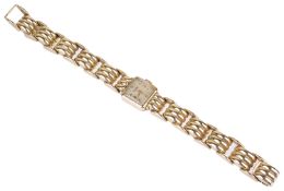 A 14k gold E Gubelin ladies wristwatch