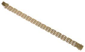 A heavy fully articulated 9ct four bar gold bracelet