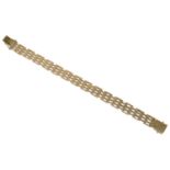 A heavy fully articulated 9ct four bar gold bracelet