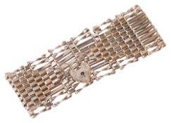 A 9ct gold wide ten bar gate bracelet