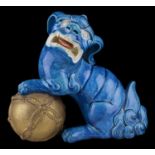 Royal Worcester turquoise majolica glazed seated figure of a Dog of Fo