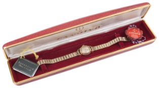 A 18ct gold Gandino ladies wristwatch with 9ct gold bracelet