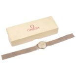 A 9ct gold Omega gentleman's wristwatch, with mesh bracelet