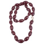 A red cherry amber bead necklace