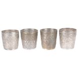 A set of four Indonesian white metal beakers, early 20th c. (4)