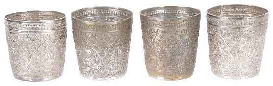 A set of four Indonesian white metal beakers, early 20th c. (4)