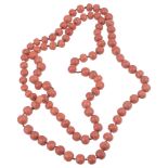 A natural red coral bead necklace