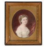 A late 19th/early 20th c. portrait miniature of a young girl on ivory