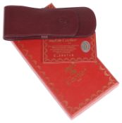 Must de Cartier burgundy leather pen holder, in red Cartier box