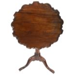 A mahogany pie crust tilt top table, 19th century and later