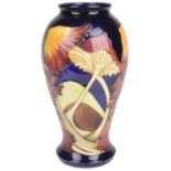 A contemporary Moorcroft vase "Parasol Dance" designed by Kerry Goodwin, circa 2005