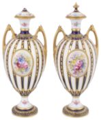 A pair of Royal Crown Derby porcelain two handled vases and covers, circa 1907