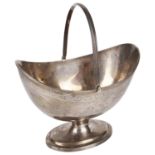 A George III silver swing handle sugar bowl, hallmarked London 1798