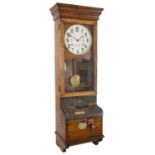 An oak cased International Time Recording Ltd clocking in/clocking out clock